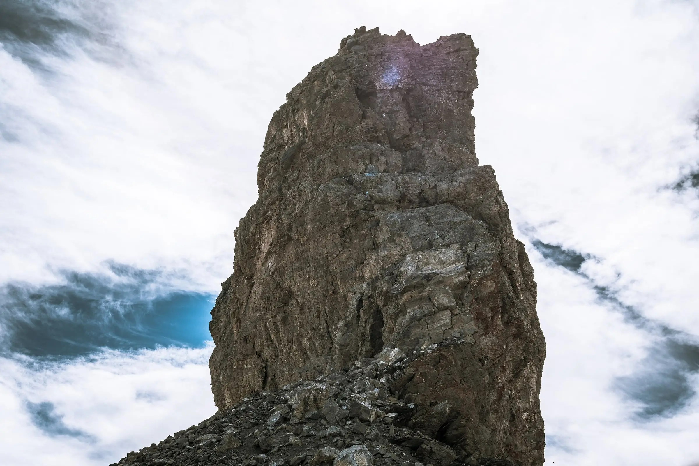 Quille du Diable pinnacle rising through swirling cloud